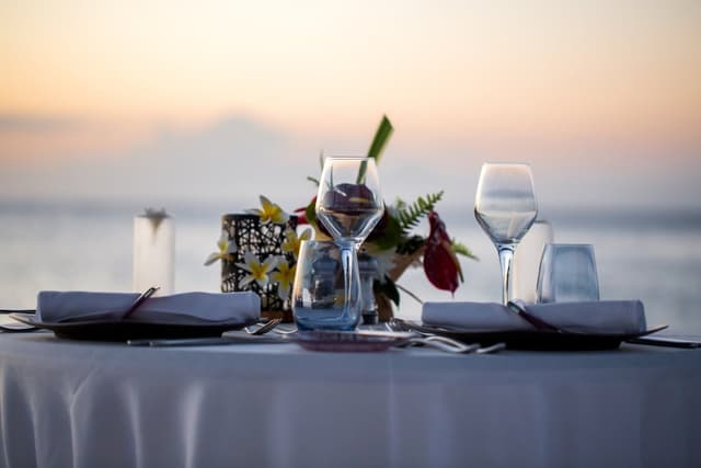 A fine dining setup with ocean views